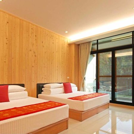Qian'S Garden Inn لوغو المظهر الخارجي الصورة