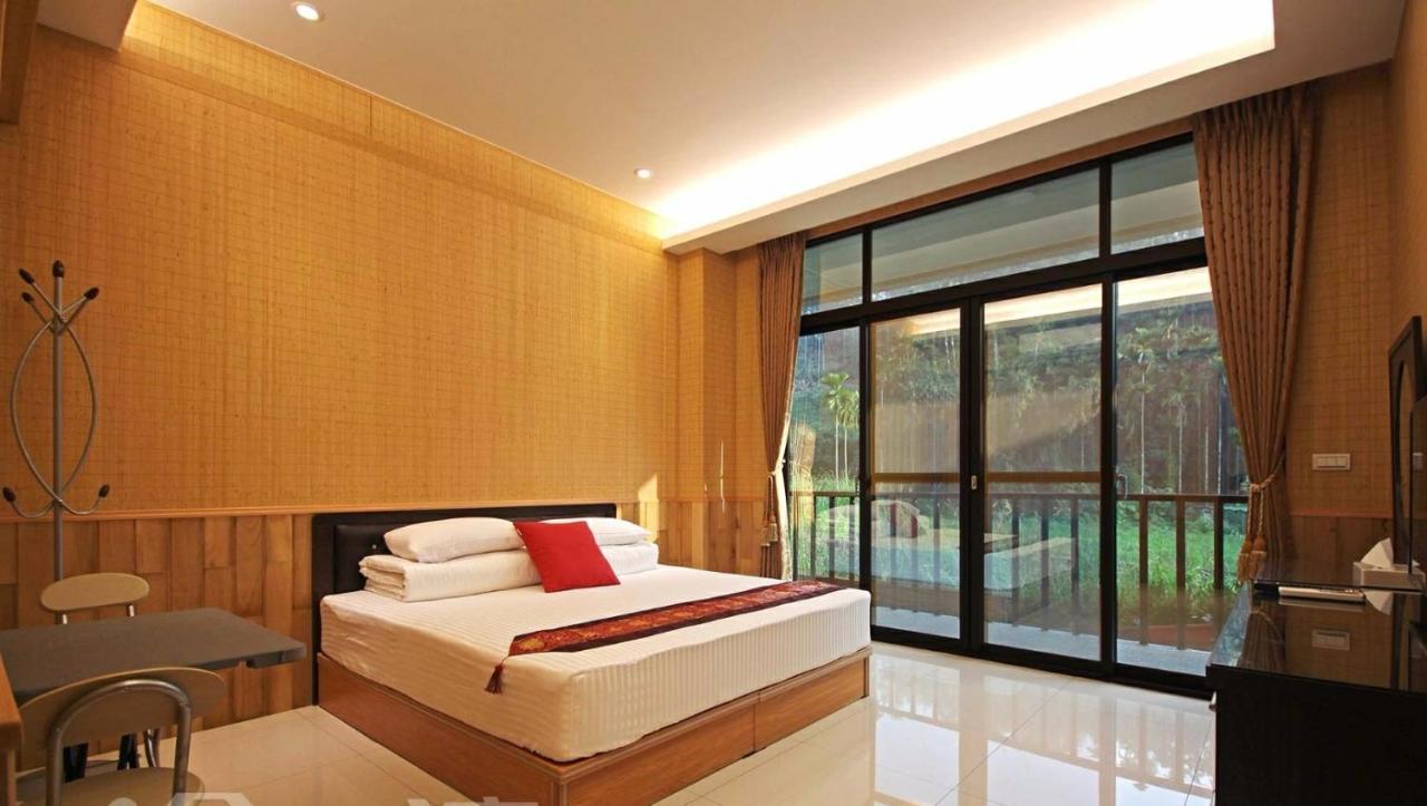 Qian'S Garden Inn لوغو المظهر الخارجي الصورة