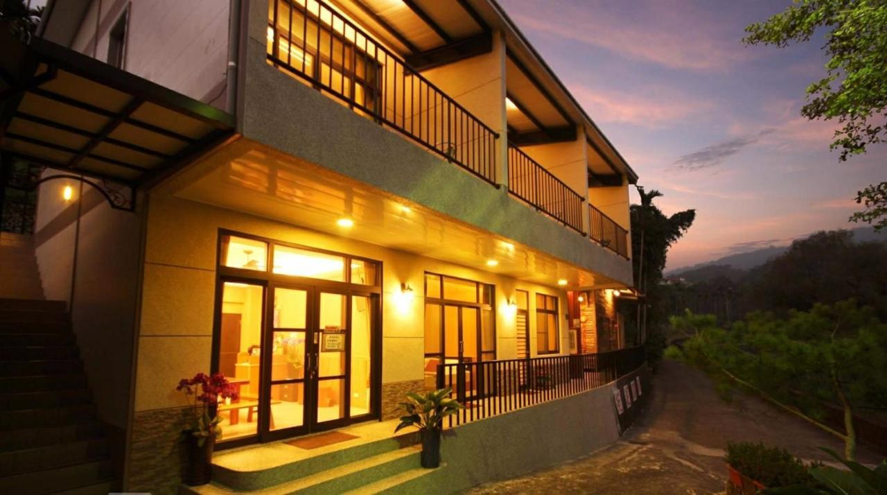 Qian'S Garden Inn لوغو المظهر الخارجي الصورة
