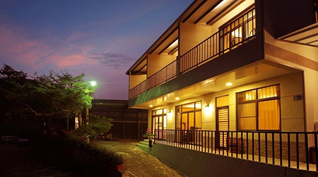 Qian'S Garden Inn لوغو المظهر الخارجي الصورة