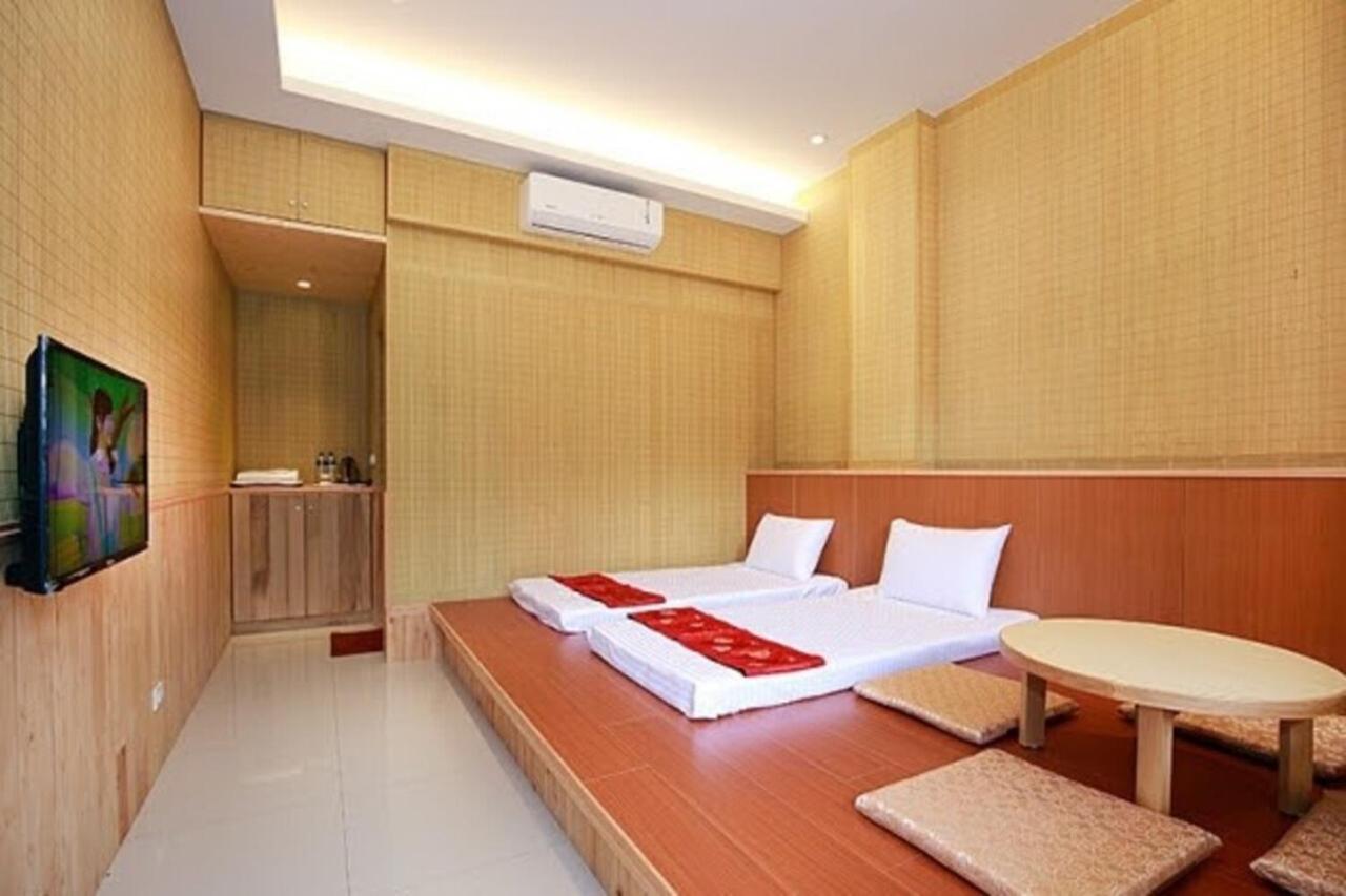 Qian'S Garden Inn لوغو المظهر الخارجي الصورة