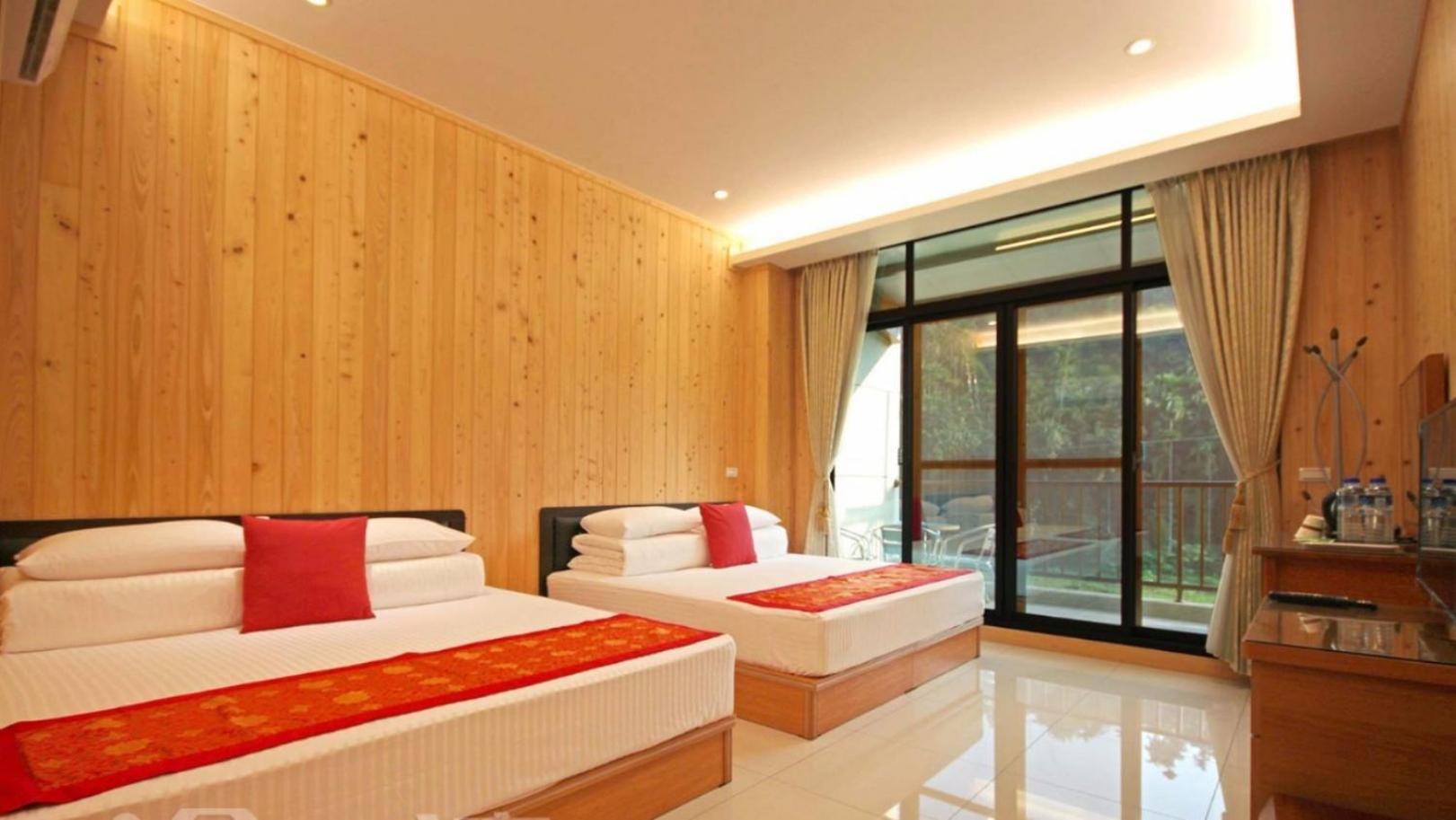 Qian'S Garden Inn لوغو المظهر الخارجي الصورة