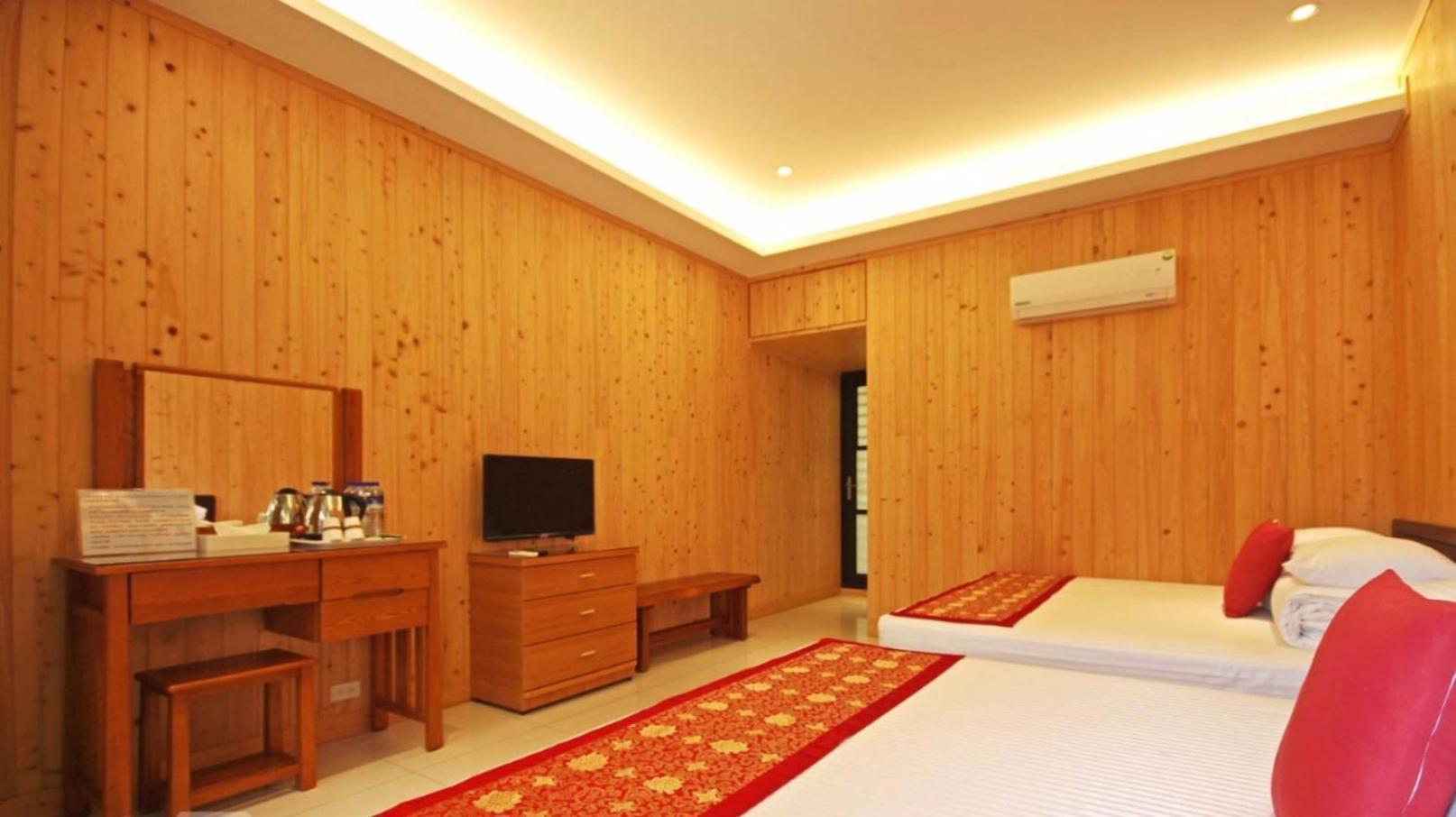 Qian'S Garden Inn لوغو المظهر الخارجي الصورة