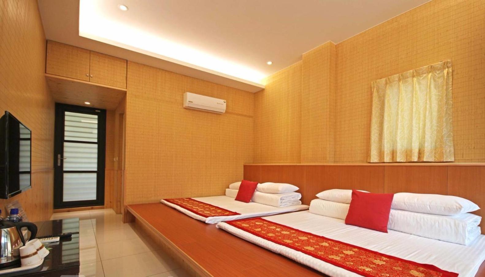 Qian'S Garden Inn لوغو المظهر الخارجي الصورة
