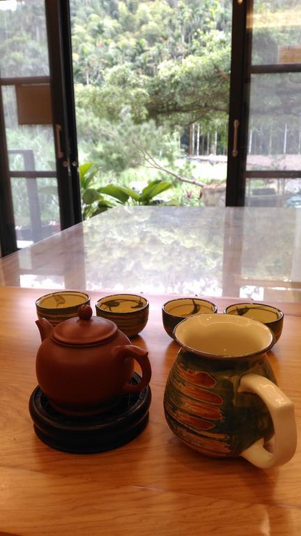 Qian'S Garden Inn لوغو المظهر الخارجي الصورة